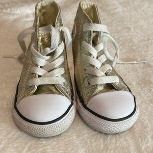 Gold Converse high tops